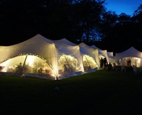 Night time image of Capri Marquees with Fairy lights installed at the Old Rectory, Pyworthy, Devon