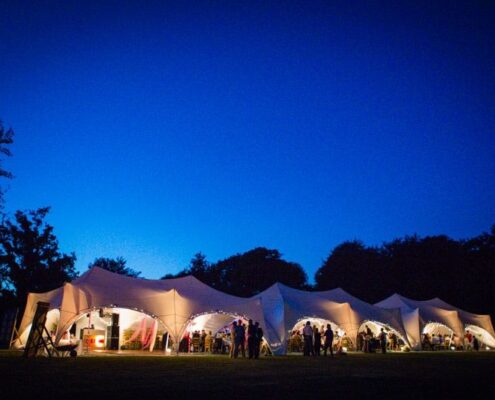 3 x Capri Marquees linked at night in Devon