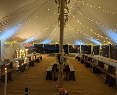 Internal image of our Celeste Pole Sailcloth 12x24m marquee with Fairy light canopy